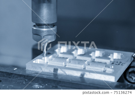 The CNC milling machine cutting the mold parts by solid ball end-mill tool. The CNC milling machine cutting the mold parts by solid ball end-mill tool. 75136274
