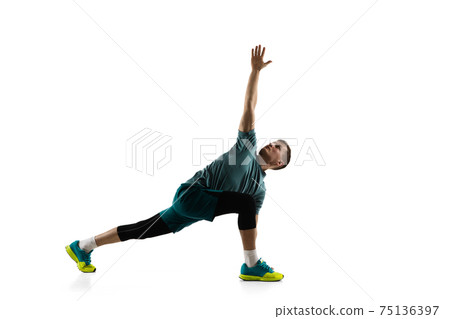 Young caucasian male model in action, motion isolated on white background. Concept of sport, movement, energy and dynamic, healthy lifestyle. Training, practicing. 75136397