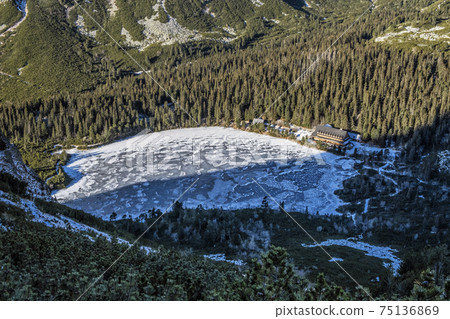 Poprad tarn with hut, High Tatras mountains, Slovakia 75136869