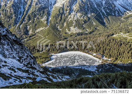 Poprad tarn with hut, High Tatras mountains, Slovakia 75136872