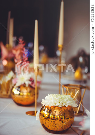 restaurant table setout with white plates and silverware 75138638