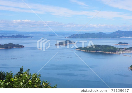View of Shodoshima and Okayama prefectures from the Dankomine Observatory in Takamatsu City, Kagawa Prefecture View of Shodoshima and Okayama prefectures from the Dankomine Observatory in Takamatsu City, Kagawa Prefecture 75139637