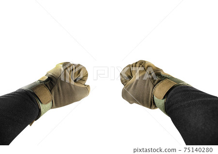 Isolated first person view photo of arm fists in tactical gloves and black jacket. 75140280