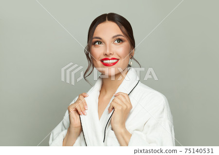 Beautiful young woman brunette smiling on white background 75140531