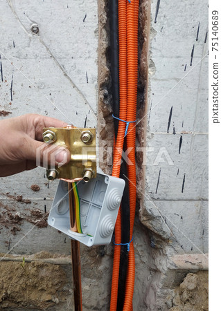 Grounding of all household electric devices and equipment, Grounding for protection against discharges of static and atmospheric electricity, installation of a copper tube. Grounding of all household electric devices and equipment, Grounding for protection against discharges of static and atmospheric electricity, installation of a copper tube. 75140689