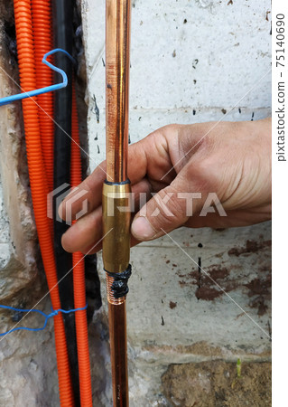 Grounding of all household electric devices and equipment, Grounding for protection against discharges of static and atmospheric electricity, installation of a copper tube. 75140690