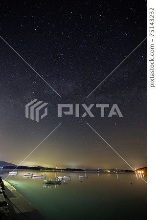 Early summer starry view of Setouchi: Milky Way rising to the fishing port and Summer Triangle Early summer starry view of Setouchi: Milky Way rising to the fishing port and Summer Triangle 75143232