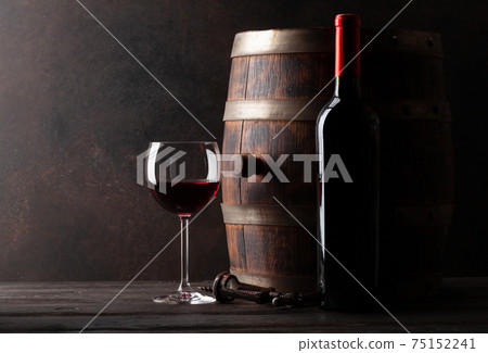 Red wine bottle, glass and old barrel Red wine bottle, glass and old barrel 75152241