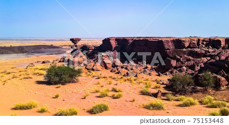 Rock formation at Sahara desert near Tchirozerine region, Agadez Rock formation at Sahara desert near Tchirozerine region, Agadez 75153448