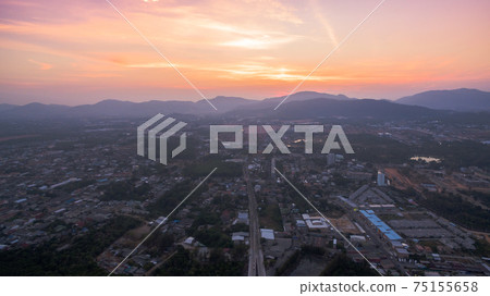 The sun rises over Thepsrisin Bridge. Thepsrisin Bridge is a shortcut to connect the city from Saphan Hin intersection with Sakdidet intersection in order to reduce the bad traffic congestion. 75155658