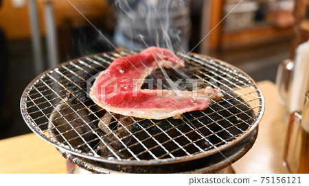 Brightly colored grilled meat (kalbi) Brightly colored grilled meat (kalbi) 75156121