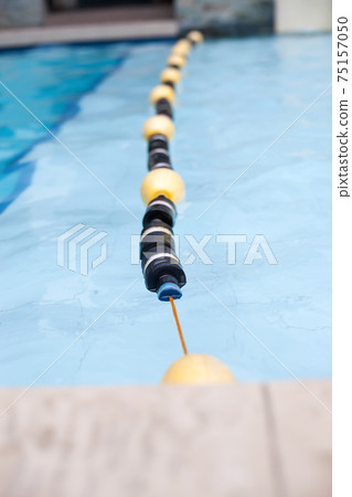 Safety Bobbers in swimming pool at poolside 75157050