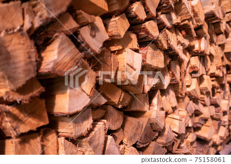 Stacked wood for a wood stove Stacked wood for a wood stove 75158061
