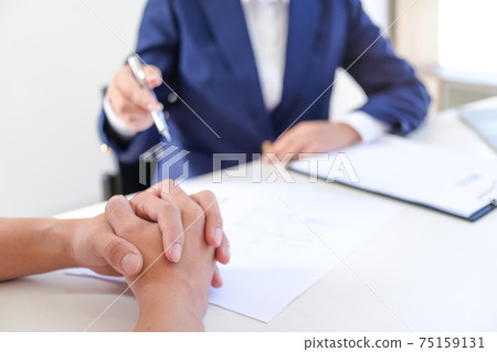 Sales manager giving advice application form document, considering mortgage loan offer for car and house insurance. Sales manager giving advice application form document, considering mortgage loan offer for car and house insurance. 75159131