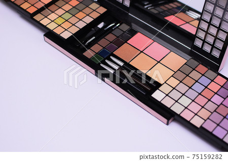 Eyeshadow palette on white background. eye shadows cosmetics product. Fashion blog design. copy space Eyeshadow palette on white background. eye shadows cosmetics product. Fashion blog design. copy space 75159282