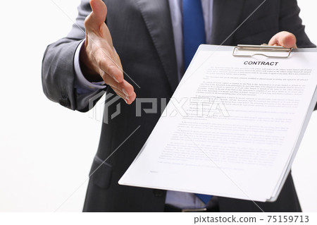 Man in suit and tie give hand as hello in office Man in suit and tie give hand as hello in office 75159713