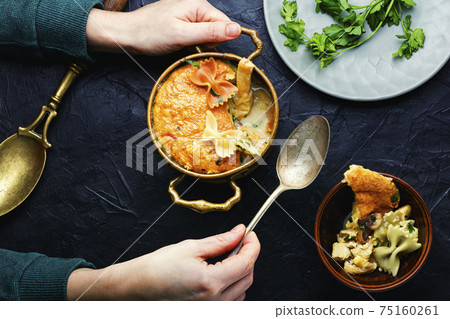 Delicious meat casserole with macaroni Delicious meat casserole with macaroni 75160261