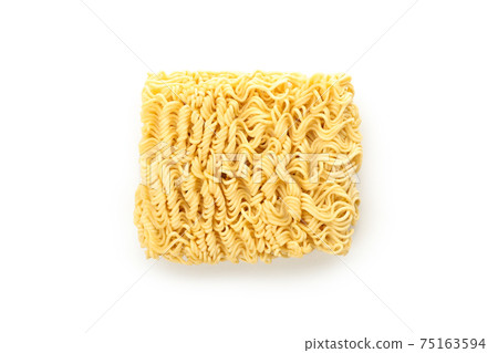 Uncooked instant noodles isolated on white background Uncooked instant noodles isolated on white background 75163594