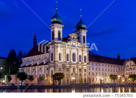 Lucerne. Old city embankment and medieval houses at dawn. 75165703