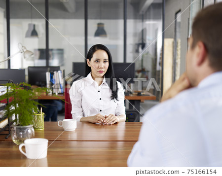 young asian businesswoman looking serious and nervous during a job interview 75166154