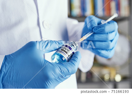 man about to inoculate the covid-19 vaccine man about to inoculate the covid-19 vaccine 75166193