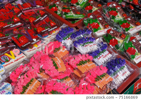 CAMERON HIGHLAND, MALAYSIA -MARCH 2, 2020: Magnetic refrigerators are sold wholesale in baskets. Sold in Malaysian ringgit. Tourists love to buy it as a souvenir. CAMERON HIGHLAND, MALAYSIA -MARCH 2, 2020: Magnetic refrigerators are sold wholesale in baskets. Sold in Malaysian ringgit. Tourists love to buy it as a souvenir. 75166869