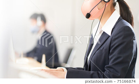 Staff working with masks and headsets Staff working with masks and headsets 75166874
