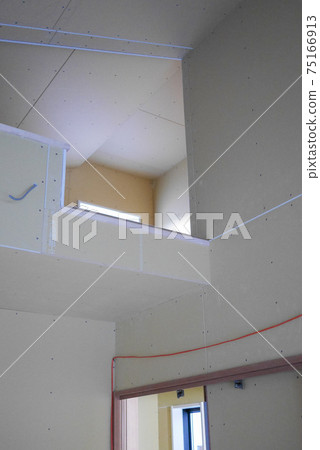 Inside a newly built single-family house under construction (after putting up wall panels) Inside a newly built single-family house under construction (after putting up wall panels) 75166913