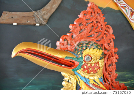 TERENGGANU, MALAYSIA -JUNE 5, 2019: Wooden carvings with bird head motifs are fished by fishermen on the east coast of Malaysia as decorative objects. This decoration is called the Perahu Bangau. TERENGGANU, MALAYSIA -JUNE 5, 2019: Wooden carvings with bird head motifs are fished by fishermen on the east coast of Malaysia as decorative objects. This decoration is called the Perahu Bangau. 75167080