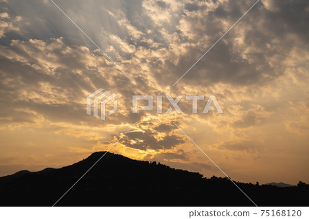 Landscape of silhouette mountain and clouds sunset lighting Landscape of silhouette mountain and clouds sunset lighting 75168120