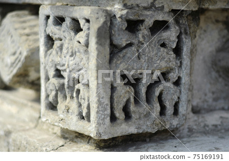 JOGJAKARTA, INDONESIA -JUNE 12, 2014: Stone work design and detail at Old Masjid Besar Mataram Kotagede, Jogjakarta Indonesia. According to history, the mosque was build on 1575. JOGJAKARTA, INDONESIA -JUNE 12, 2014: Stone work design and detail at Old Masjid Besar Mataram Kotagede, Jogjakarta Indonesia. According to history, the mosque was build on 1575. 75169191