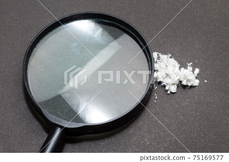 Hazardous mineral asbestos close up on black background 75169577