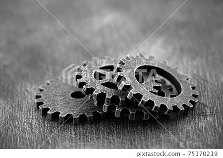 Group of old gears and cogs macro shot, industrial background 75170219