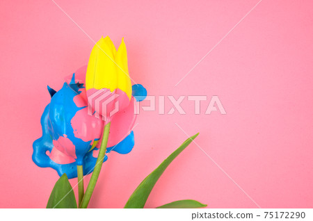 Colorful acrylic and yellow flower, tulip flat lay on clear pink background. Dripping vivid candy ink medium colors, blue, pink on floral. For your any ideas of important days, flat lay, artwork Colorful acrylic and yellow flower, tulip flat lay on clear pink background. Dripping vivid candy ink medium colors, blue, pink on floral. For your any ideas of important days, flat lay, artwork 75172290