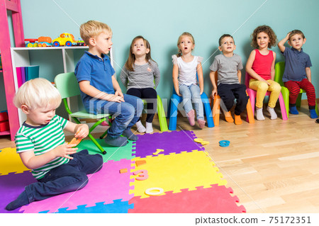 Preschool kids can be engaged into listening Preschool kids can be engaged into listening 75172351