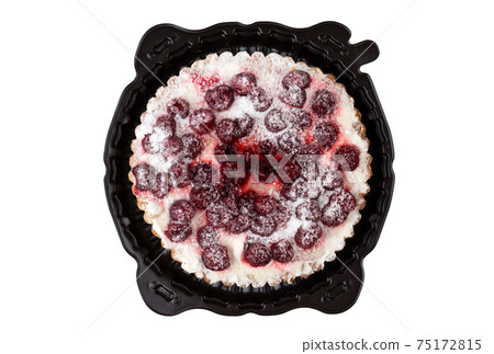 Cherry pie on a white background. Close-up of cherry pie in a plastic container. Top View. 75172815