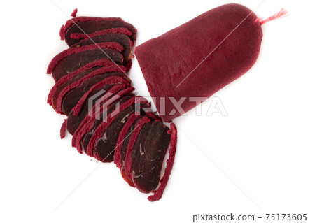 Jerky on a white background. Close-up of basturma sliced into pieces. 75173605