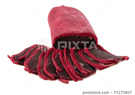 Jerky on a white background. Close-up of basturma sliced into pieces. 75173607