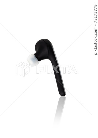 Bluetooth headset on a white background. Wireless headset close up on a white background. 75173779