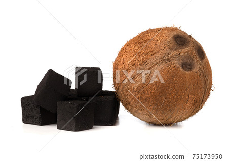 Coconut charcoal on a white background. Coconut coal cubes for hookah and coconut close-up. 75173950