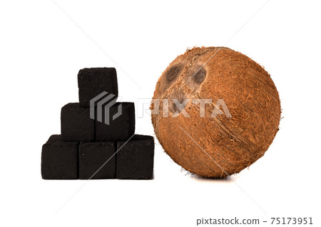 Coconut charcoal on a white background. Coconut coal cubes for hookah and coconut close-up. 75173951