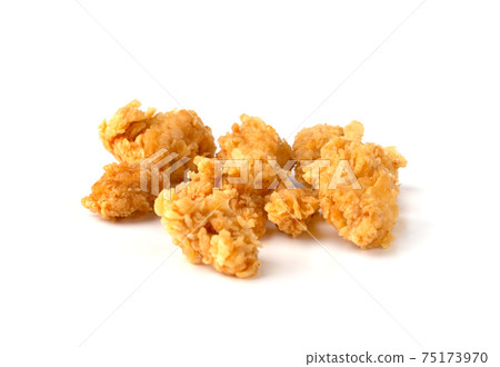 Slices of roasted meat on a white background. Fried chicken fillet close-up. Slices of roasted meat on a white background. Fried chicken fillet close-up. 75173970