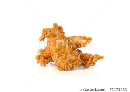 Fried chicken fillets on a white background. Fried chicken nuggets close-up. 75173983