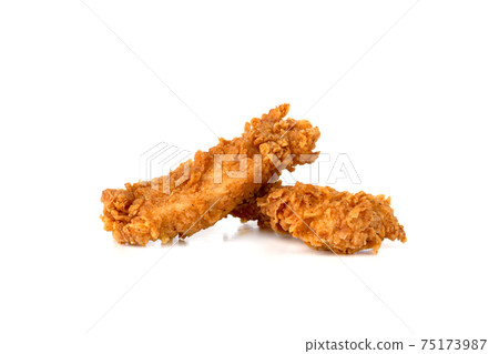 Fried chicken fillets on a white background. Fried chicken nuggets close-up. 75173987