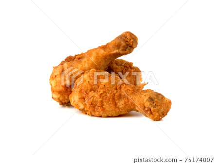 Fried legs on a white background. Chicken legs deep fried close-up. Fried legs on a white background. Chicken legs deep fried close-up. 75174007