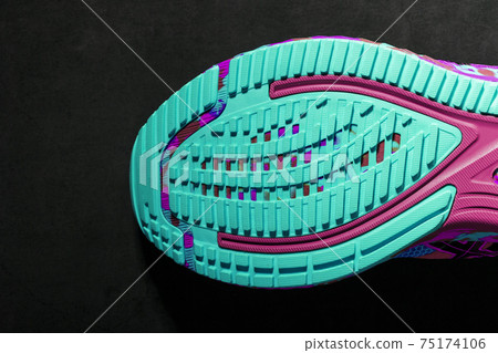 Turquoise outsole tread with sports sneakers for jogging and fitness. Sports style, close-up Turquoise outsole tread with sports sneakers for jogging and fitness. Sports style, close-up 75174106