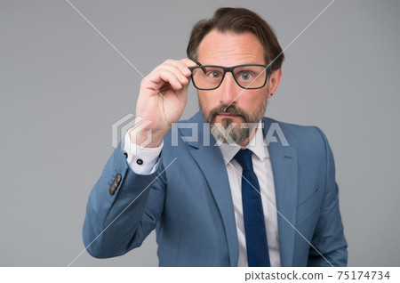 Serious businessman. Education for adults. Self education. 75174734