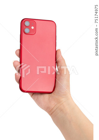 Smartphone in hand on a white background. 75174975