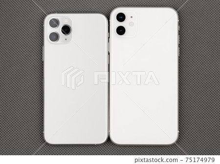 Two smartphones on a gray background. Two smartphones on a gray background. 75174979