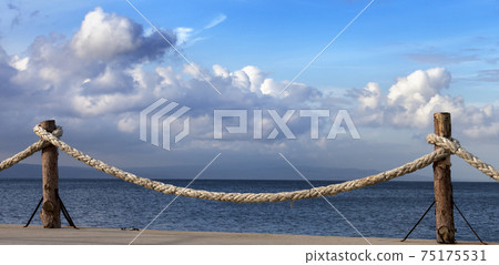 Panoramic view on seafront and sky with sunlight clouds 75175531